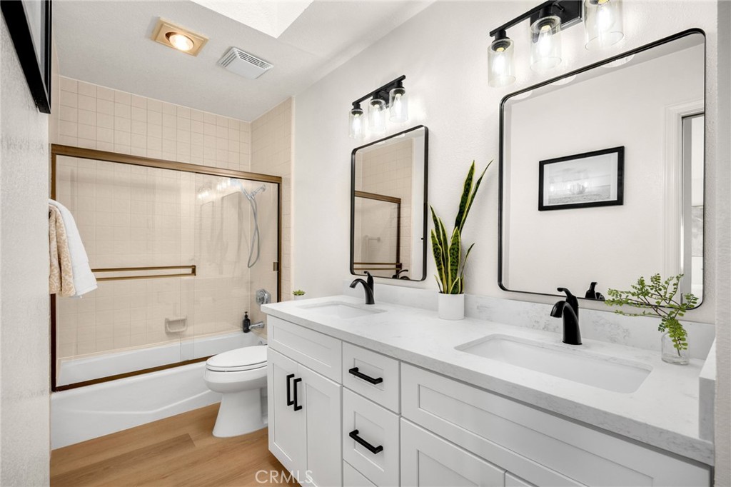 1445 South Pacific Street, Unit R Oceanside, CA 92054 - Photo 22 of 35 dual sinks, new floors, shaker cabinents, quartz countertops and skylights