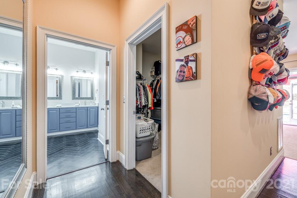 712 Bath Court Fort Mill, SC 29708 - Photo 26 of 42 a view of a hallway view with wooden floor and closet