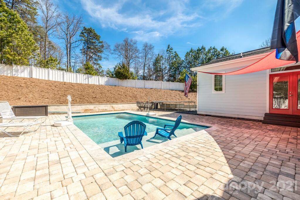 712 Bath Court Fort Mill, SC 29708 - Photo 35 of 42 a view of a backyard with swimming pool