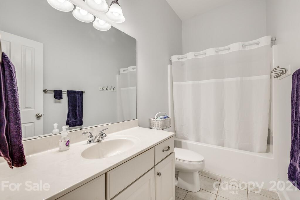 712 Bath Court Fort Mill, SC 29708 - Photo 5 of 42 a bathroom with a sink vanity mirror and toilet