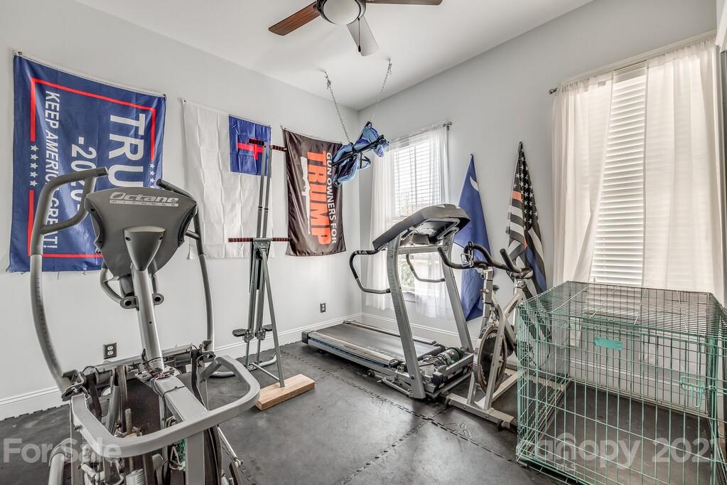 712 Bath Court Fort Mill, SC 29708 - Photo 6 of 42 a view of a room with gym equipment