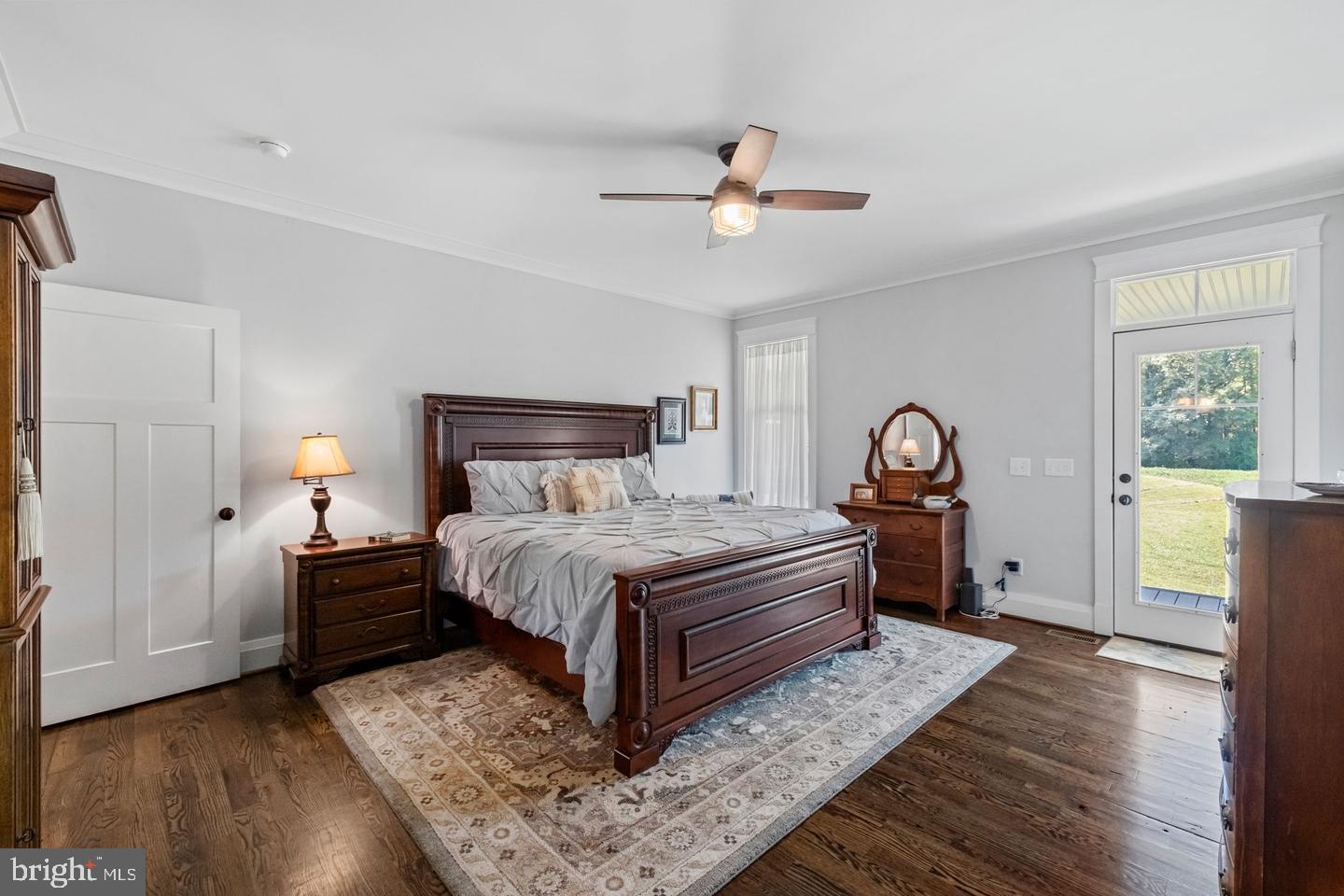 19113 Irby Spring Road Rockville, VA 23146 - Photo 49 of 75 Main level primary bedroom with outdoor access