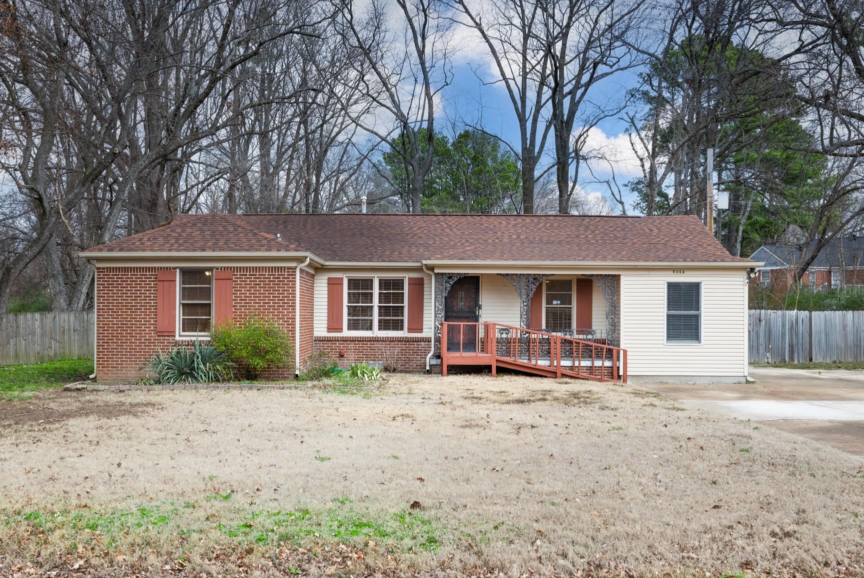 5364 Virgil Road Bartlett, TN 38134 - Photo 2 of 32 Ranch-style house with roof with shingles, brick siding, and a wooden deck