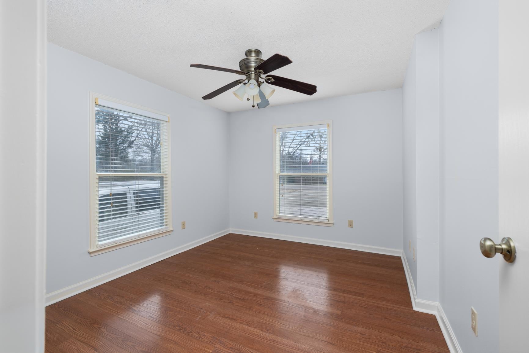 5364 Virgil Road Bartlett, TN 38134 - Photo 25 of 32 Unfurnished room featuring dark wood finished floors and a ceiling fan