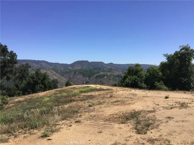 a view of side of snow with yard