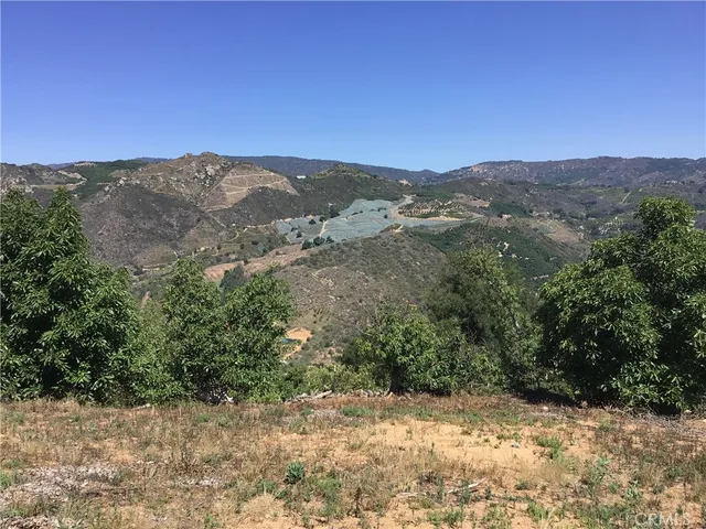 a view of a backyard of a house