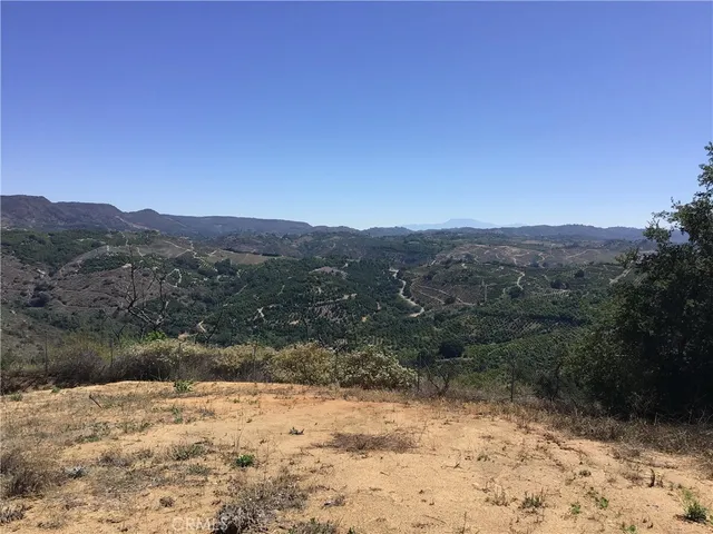 a view of a road with a yard