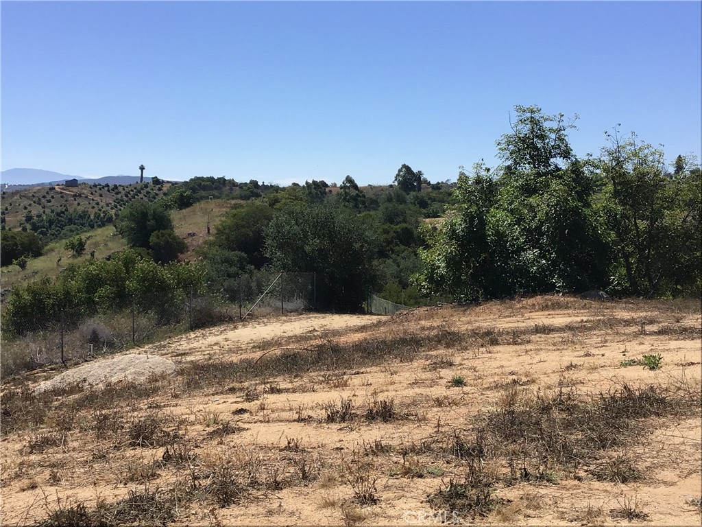 1 Monte Rancho Drive Temecula, CA 92590 - Photo 24 of 66 a view of a road with a yard