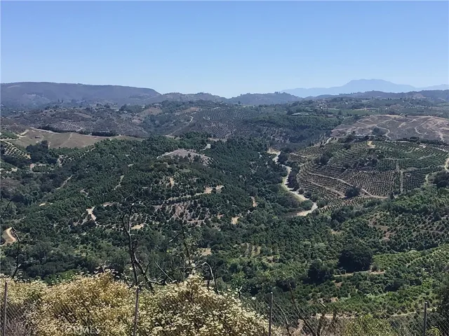 a view of a yard covered in snow