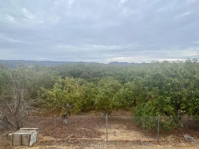 an aerial view of residential house and outdoor space