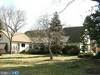 21 Brandon Road West Pennington, NJ 08534 - Photo 1 of 6 a view of a house with a big yard and large trees