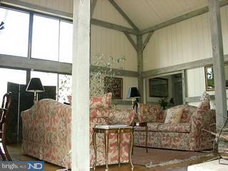 21 Brandon Road West Pennington, NJ 08534 - Photo 4 of 6 a view of living room with furniture and large windows
