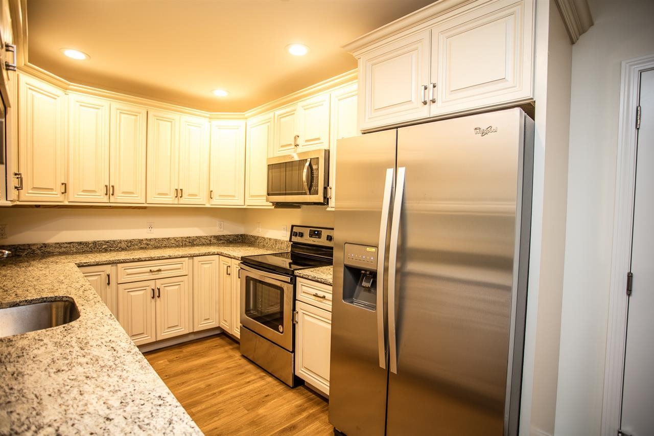 19 Kendall Pond Road, Unit 303 Derry, NH 03038 - Photo 2 of 11