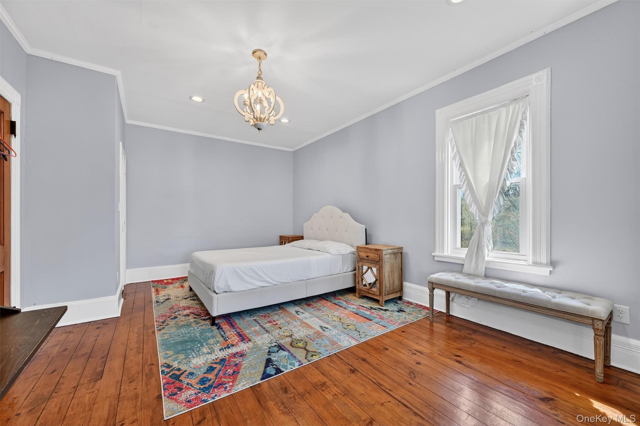 12 Perry Creek Road Washingtonville, NY 10992 - Photo 28 of 48 a spacious bedroom with a bed and a window