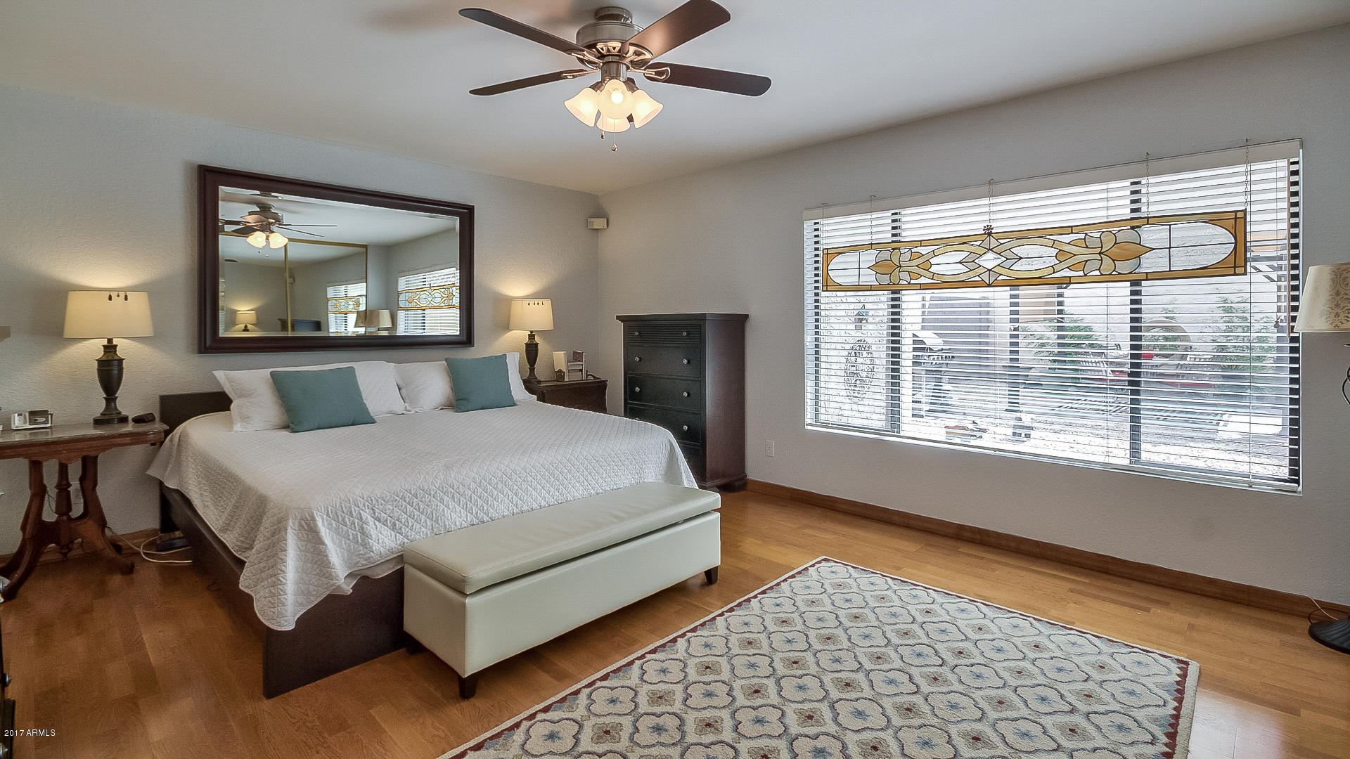 5521 South Rocky Point Road Tempe, AZ 85283 - Photo 7 of 38 a bedroom with a large bed and a window