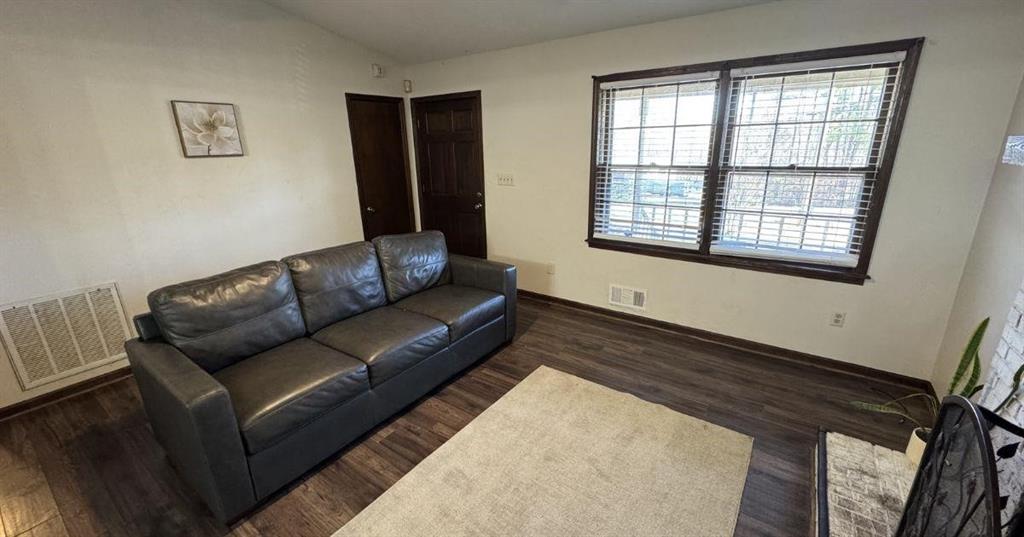 5146 Union Church Road Flowery Branch, GA 30542 - Photo 3 of 12 a living room with furniture and a window