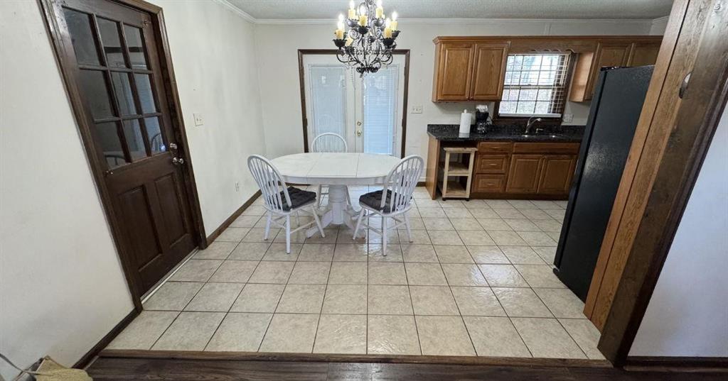 5146 Union Church Road Flowery Branch, GA 30542 - Photo 5 of 12 a view of kitchen with furniture stove and wooden floor