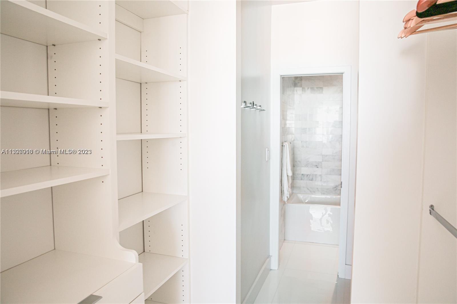 100 Lincoln Road, Unit 1643 Miami Beach, FL 33139 - Photo 7 of 7 a bathroom with a sink and a mirror