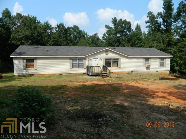 2012 Lawrence Road Molena, GA 30258 - Photo 1 of 1 a front view of a house with a yard