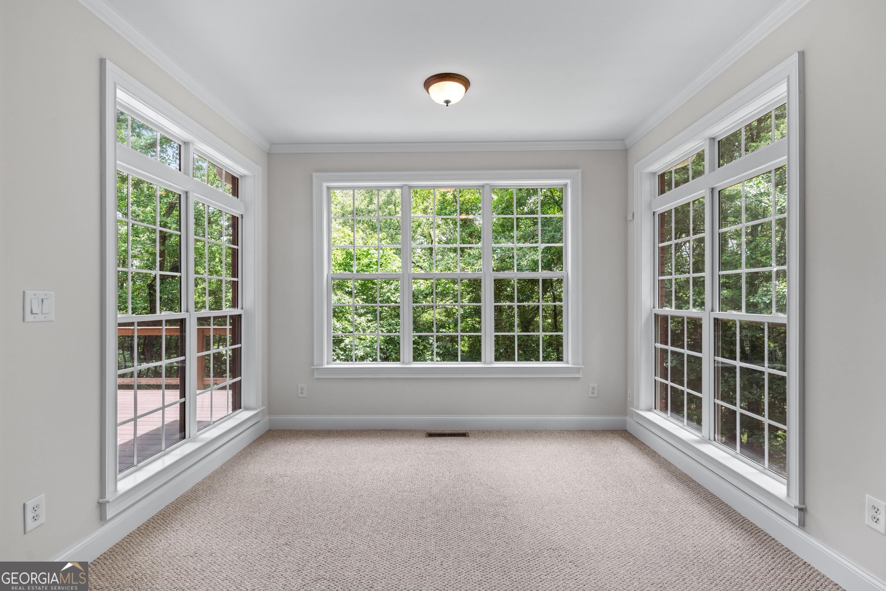 6020 Cochran Mill Road Chattahoochee Hills, GA 30213 - Photo 22 of 44 an empty room with windows