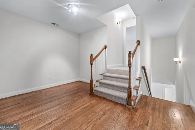 a view of entryway with wooden floor
