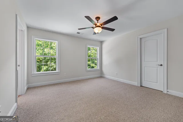 a view of an empty room with window