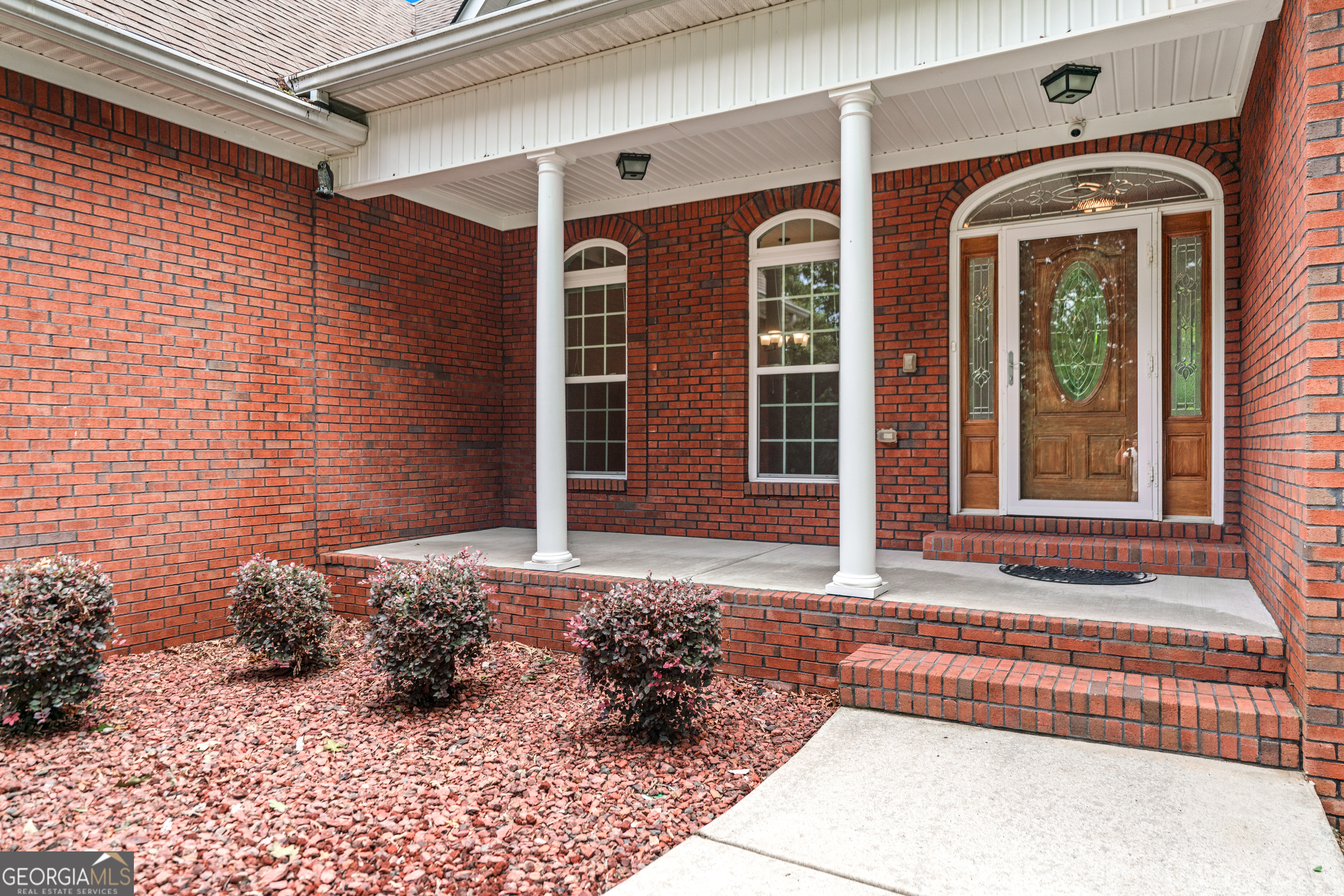 6020 Cochran Mill Road Chattahoochee Hills, GA 30213 - Photo 7 of 44 a front view of a house