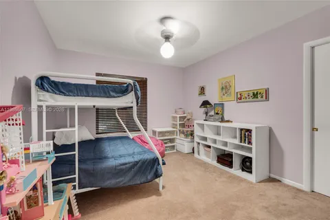 a bedroom with furniture and a bed