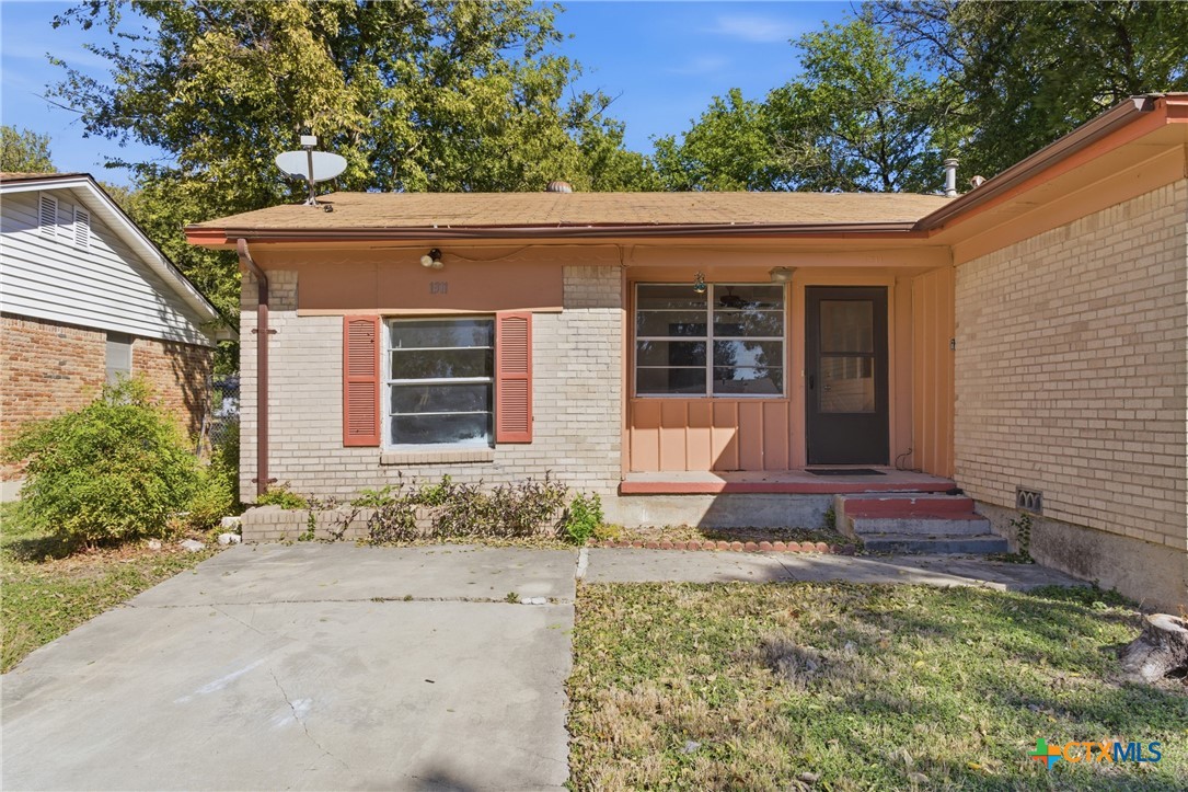 1311 Missouri Avenue Killeen, TX 76541 - Photo 6 of 29 a front view of a house with a yard