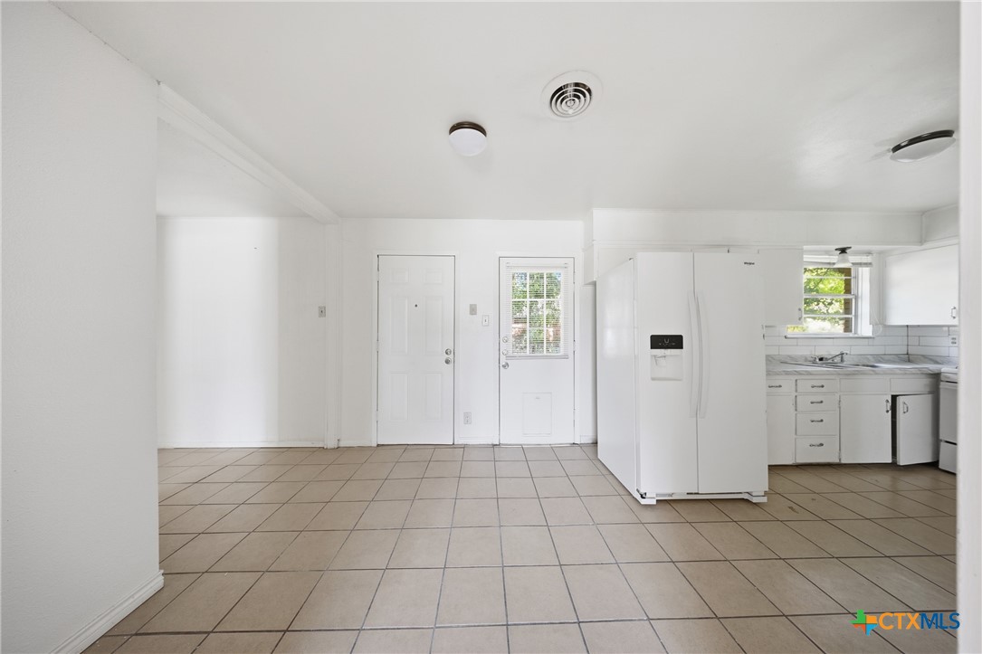 1311 Missouri Avenue Killeen, TX 76541 - Photo 10 of 29 a view of kitchen with white cabinets