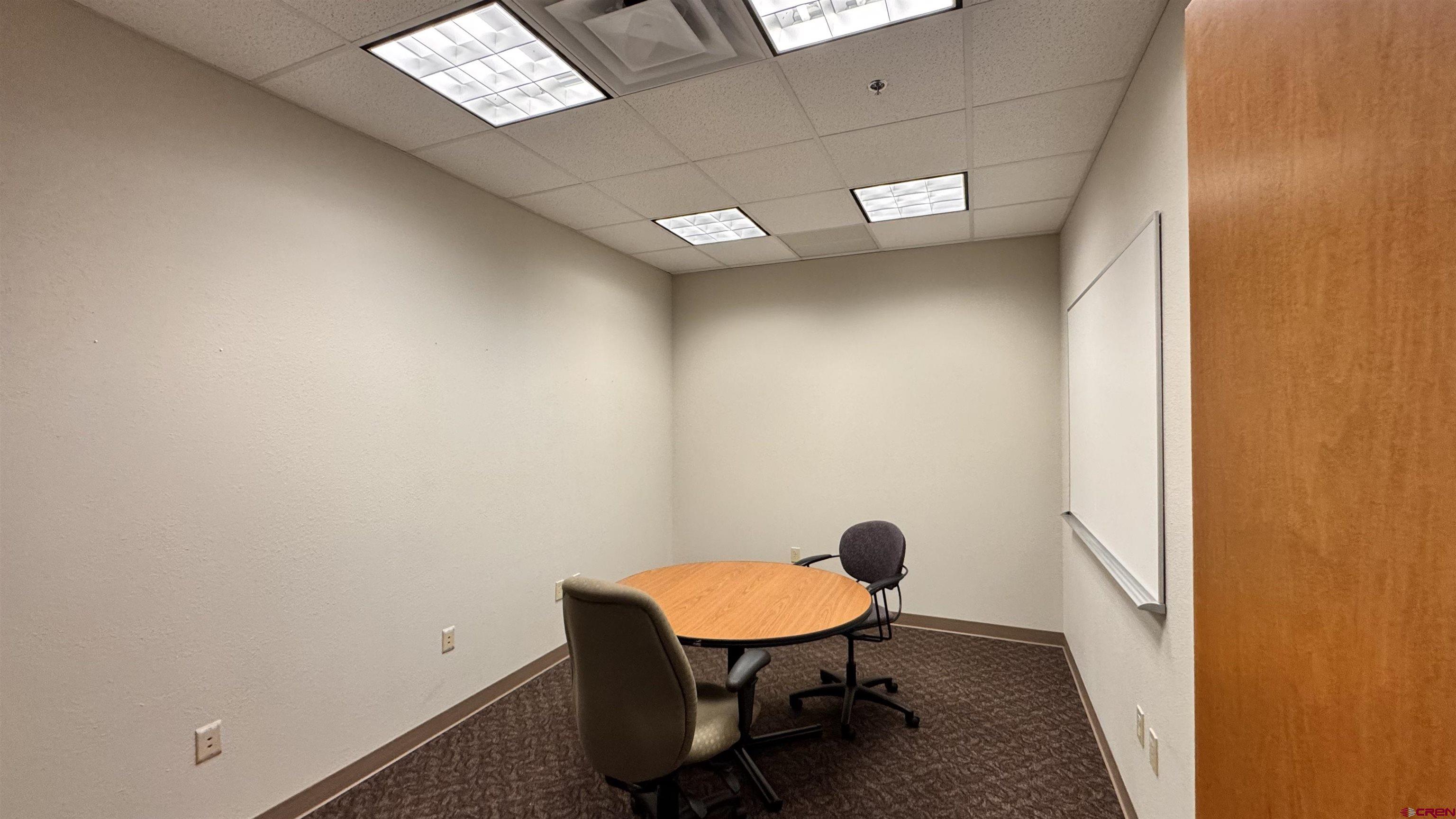175 Mercado Street, Unit 121 Durango, CO 81301 - Photo 11 of 18 a view of a room with a table and chairs