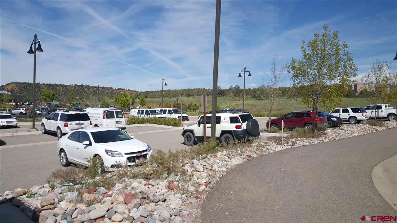 175 Mercado Street, Unit 121 Durango, CO 81301 - Photo 17 of 18 a roof deck with table and chairs