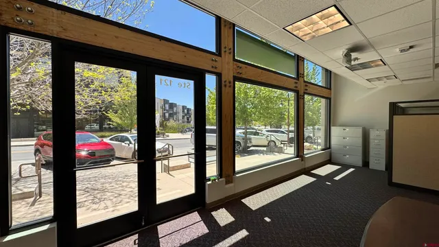 a view of a porch with furniture