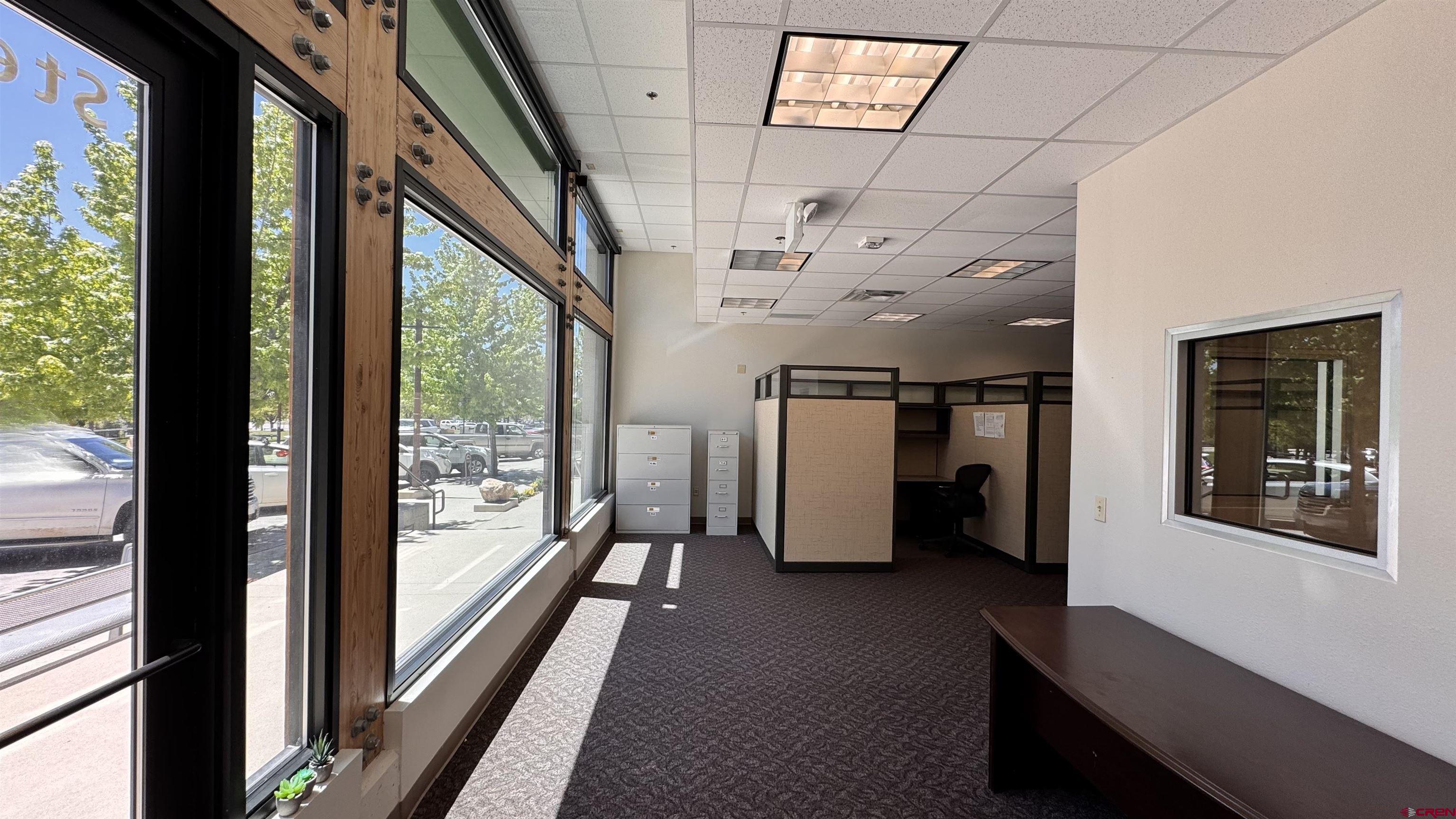 175 Mercado Street, Unit 121 Durango, CO 81301 - Photo 4 of 18 a view of a hallway with workspace