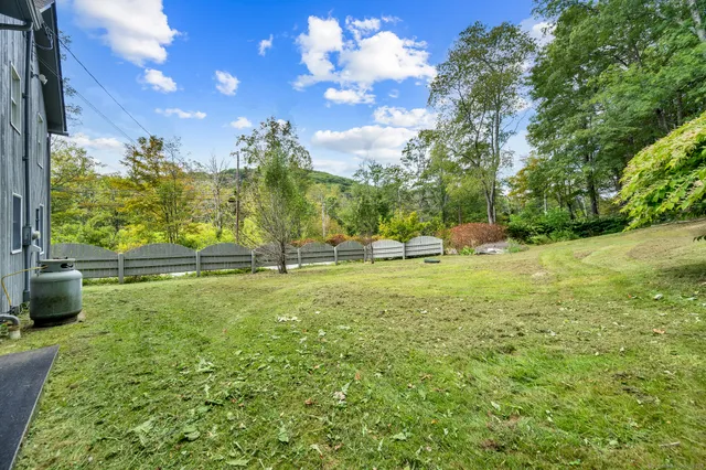 a view of a playground with basketball court