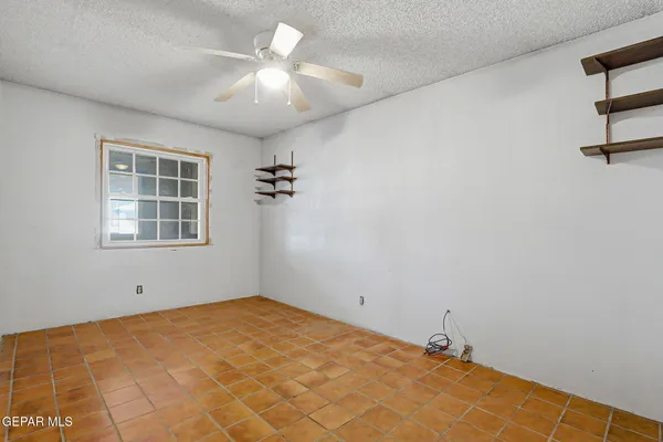 a view of empty room with windows