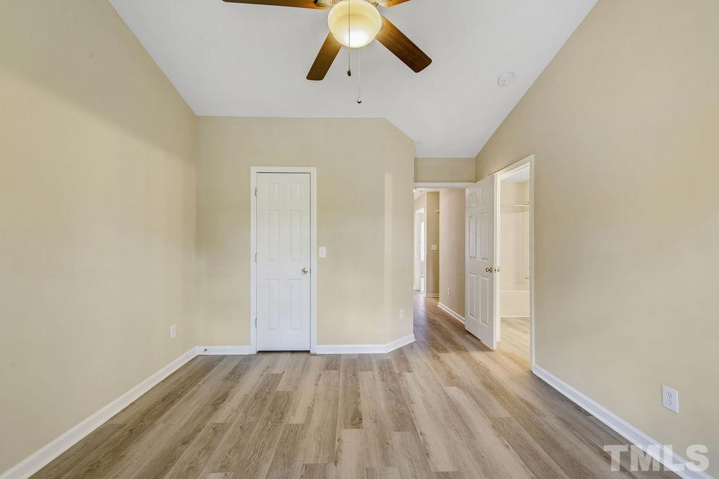 4104 Standing Rock Way Raleigh, NC 27604 - Photo 14 of 16 a view of empty room with wooden floor