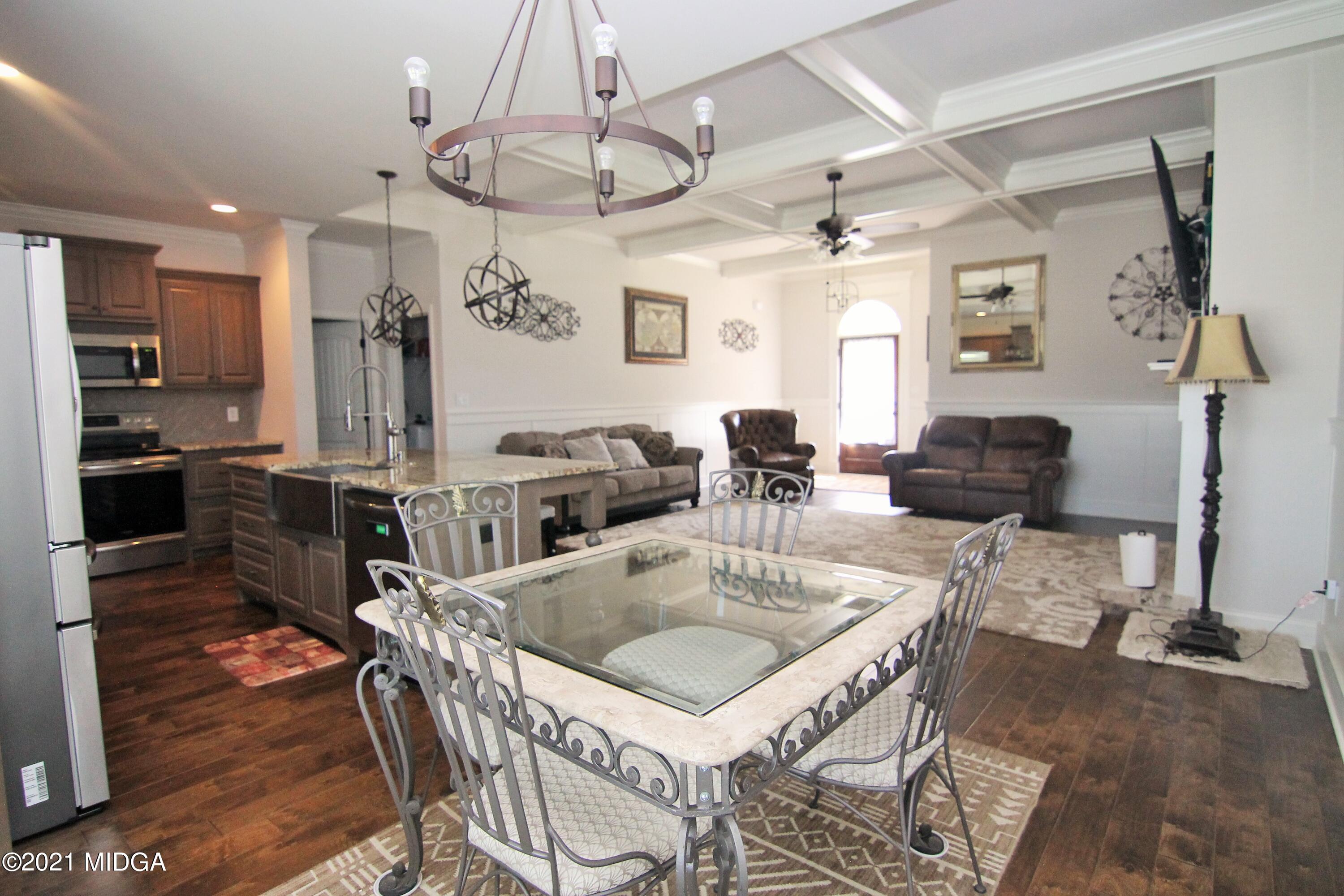 105 Timber Ridge Circle Byron, GA 31008 - Photo 11 of 28 a kitchen that has a table and chairs in it