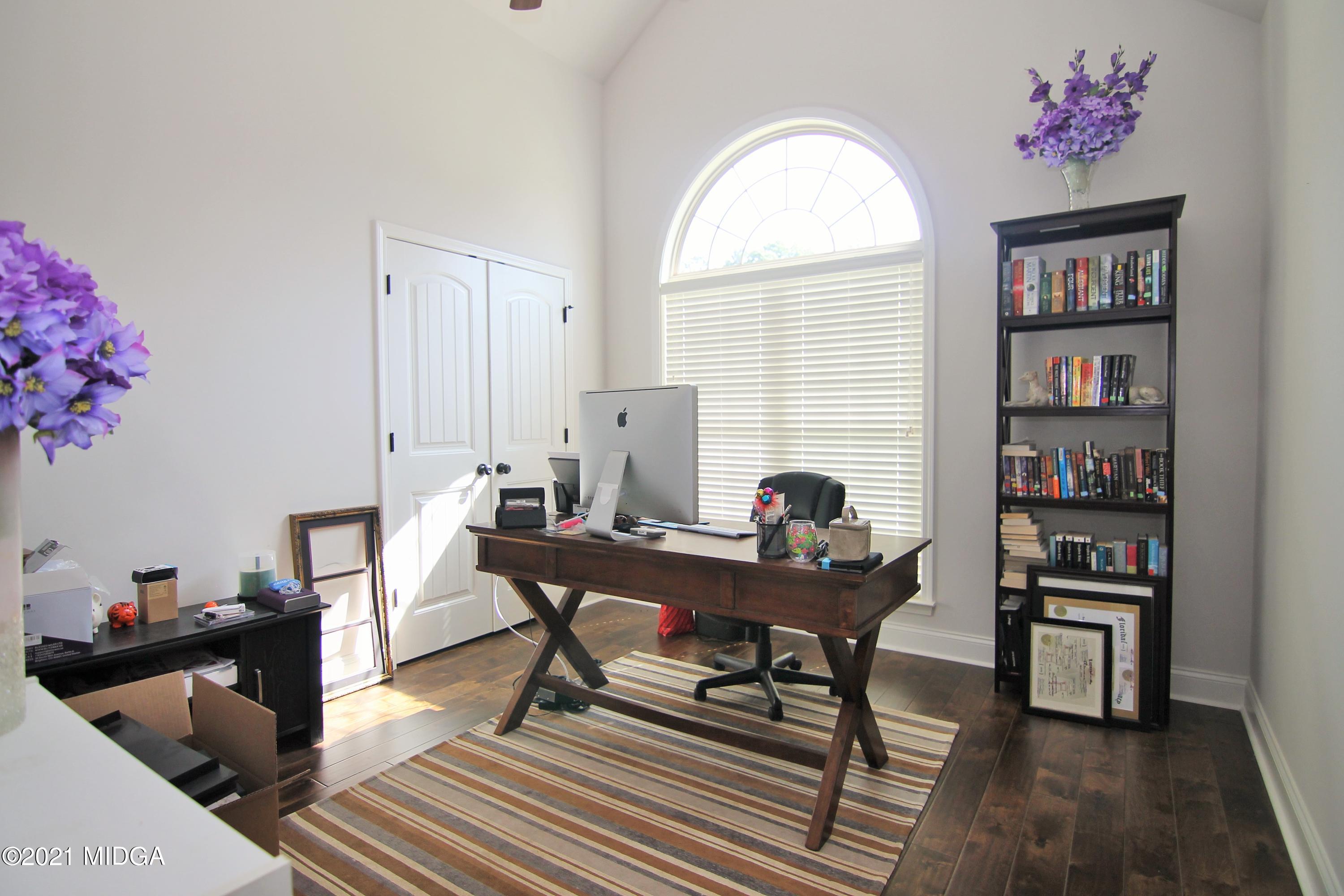 105 Timber Ridge Circle Byron, GA 31008 - Photo 18 of 28 a workspace with furniture window and wooden floor