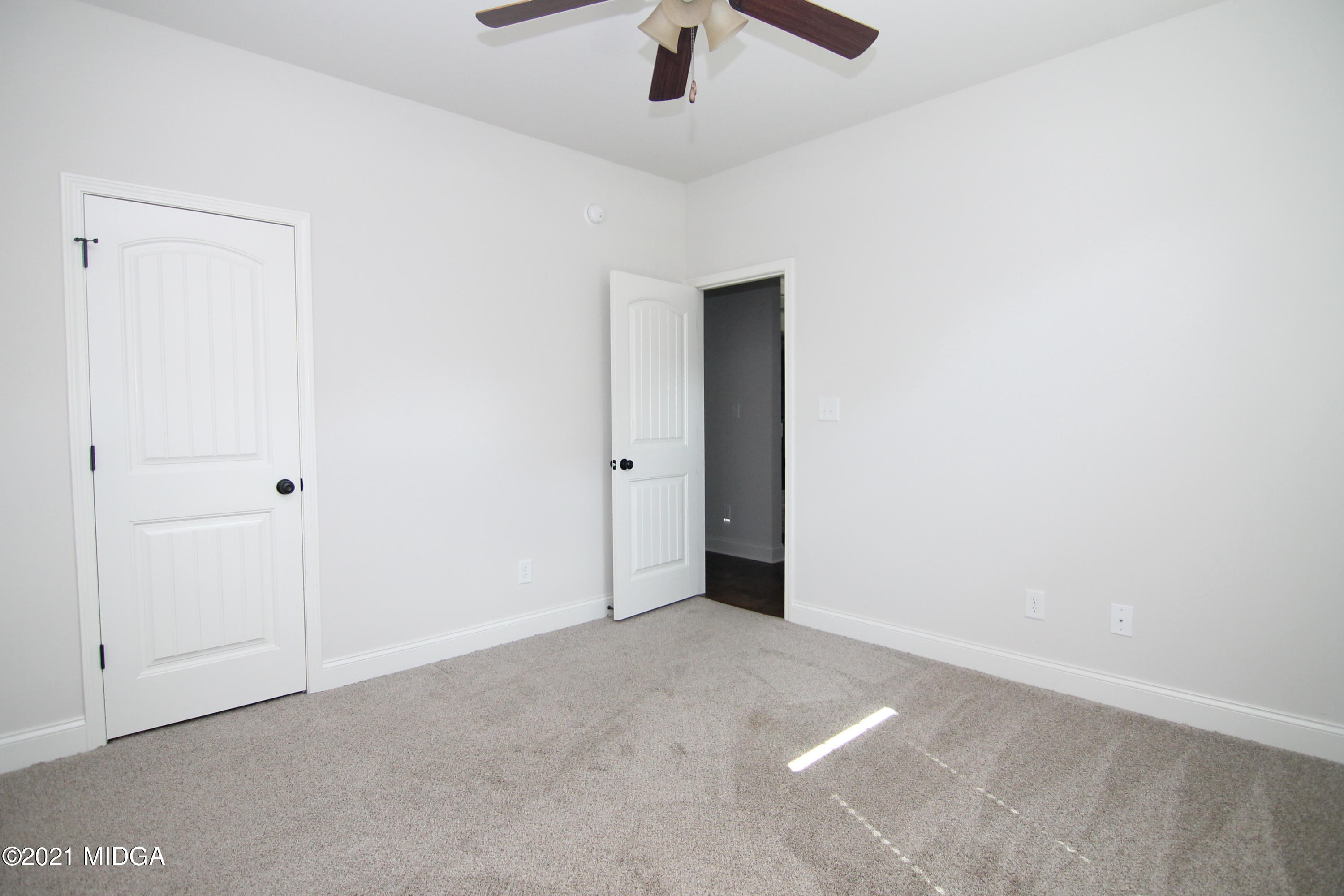 105 Timber Ridge Circle Byron, GA 31008 - Photo 20 of 28 an empty room with fan
