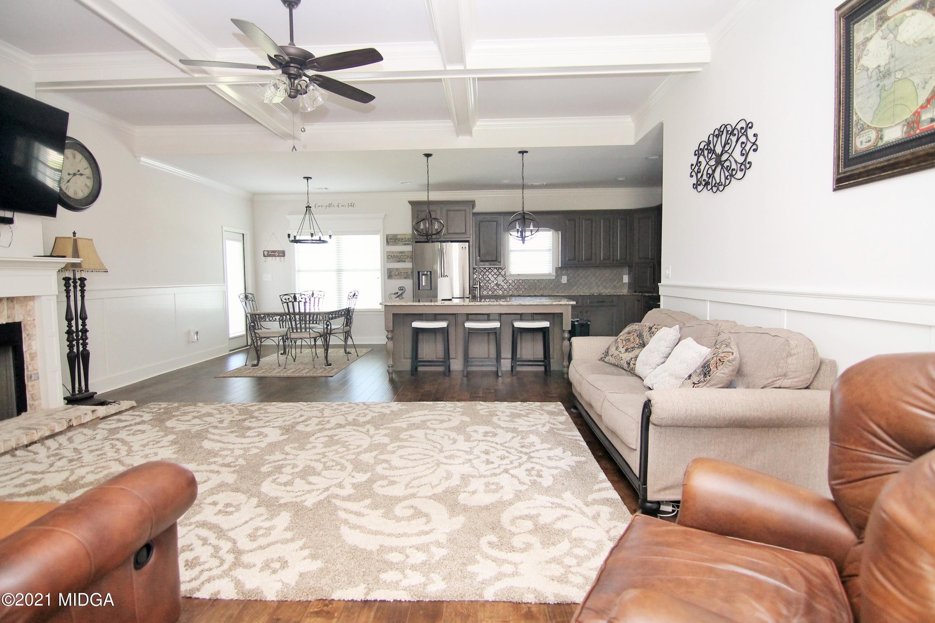 105 Timber Ridge Circle Byron, GA 31008 - Photo 3 of 28 a living room with furniture and a fireplace