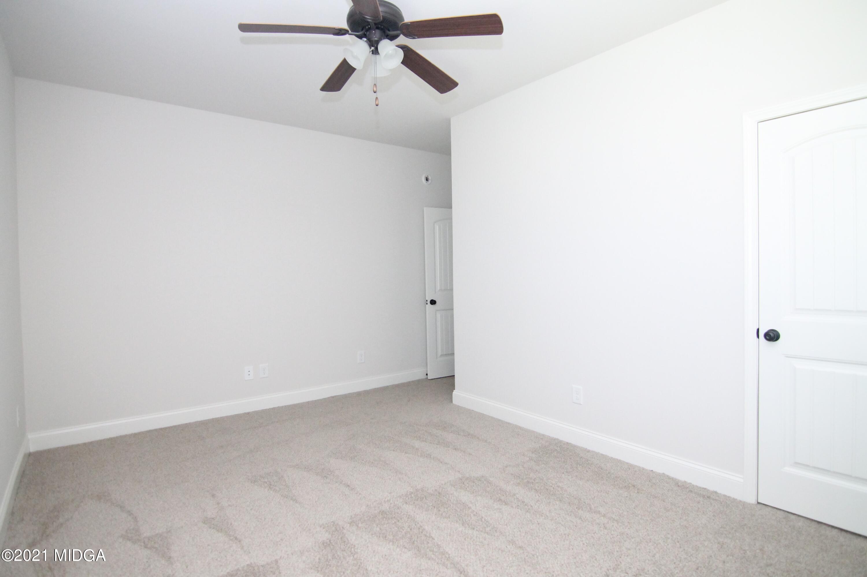 105 Timber Ridge Circle Byron, GA 31008 - Photo 23 of 28 a view of a room with a ceiling fan
