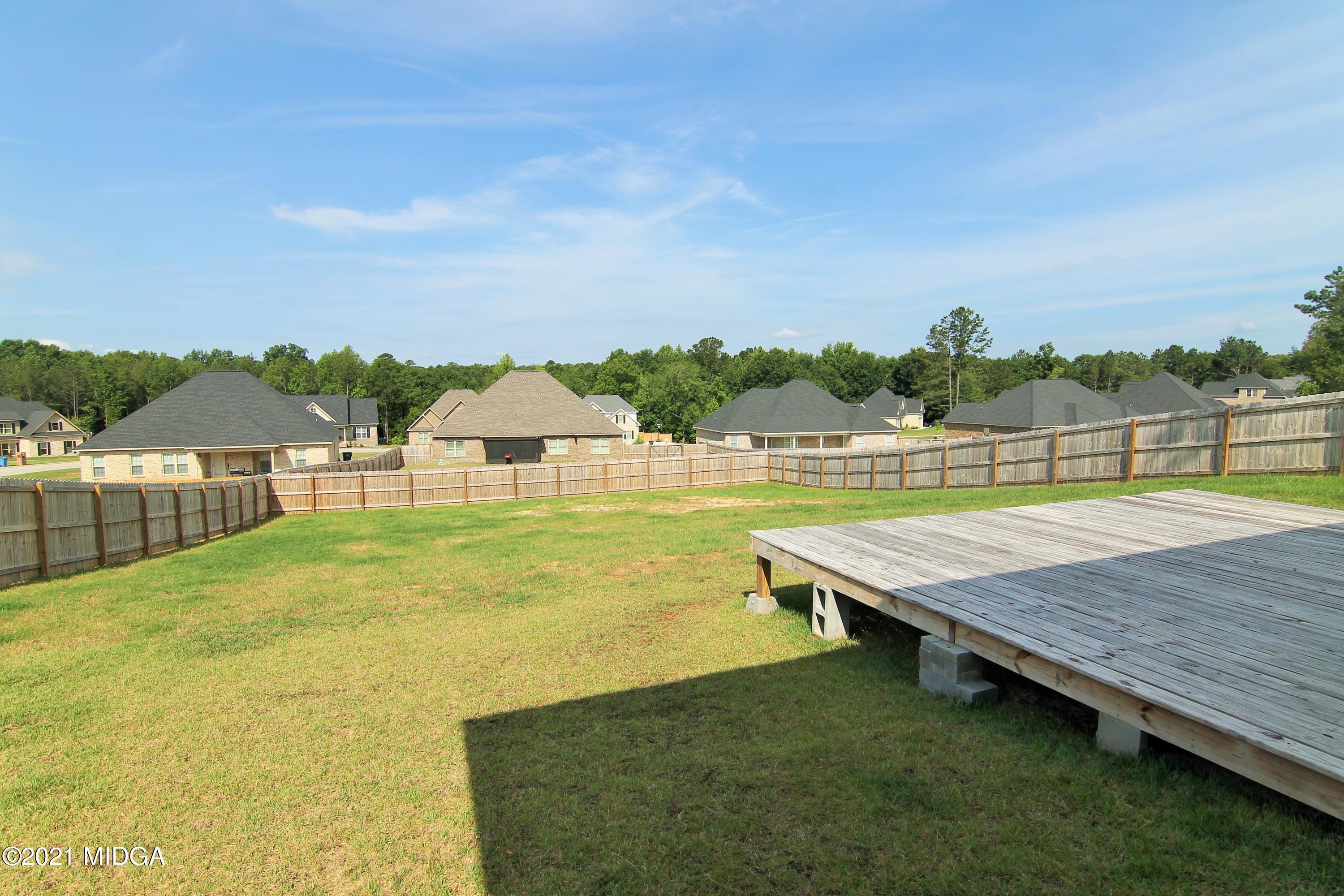 105 Timber Ridge Circle Byron, GA 31008 - Photo 24 of 28 a view of swimming pool with lake view and mountain view