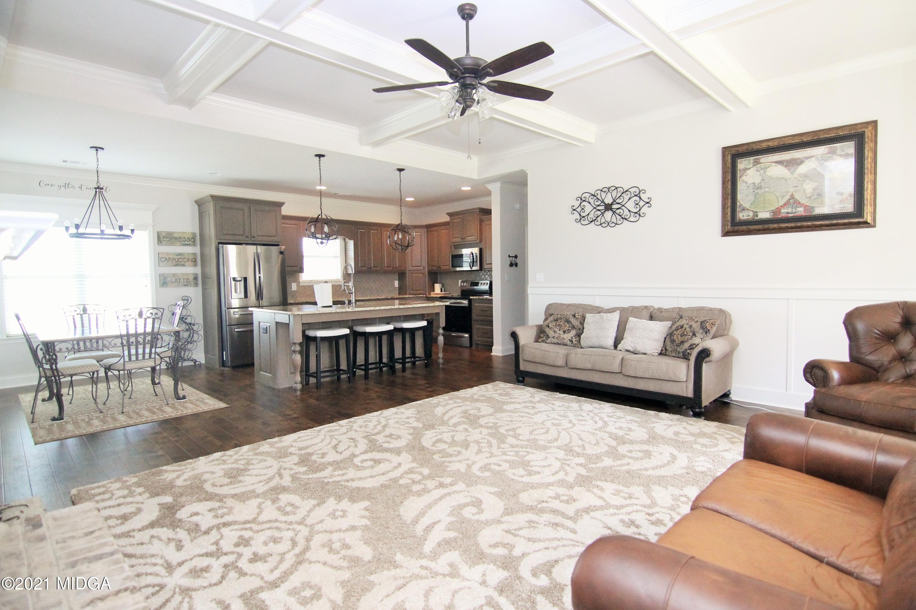 105 Timber Ridge Circle Byron, GA 31008 - Photo 5 of 28 a living room with furniture and kitchen view