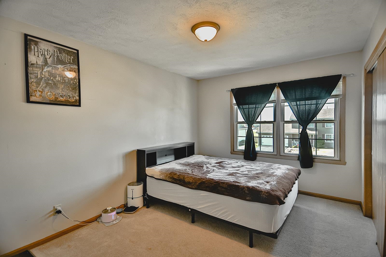 5377 Torque Road Loves Park, IL 61111 - Photo 20 of 27 a bedroom with a bed and window