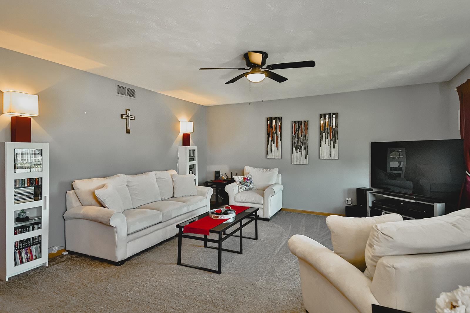 5377 Torque Road Loves Park, IL 61111 - Photo 3 of 27 a living room with furniture and a flat screen tv