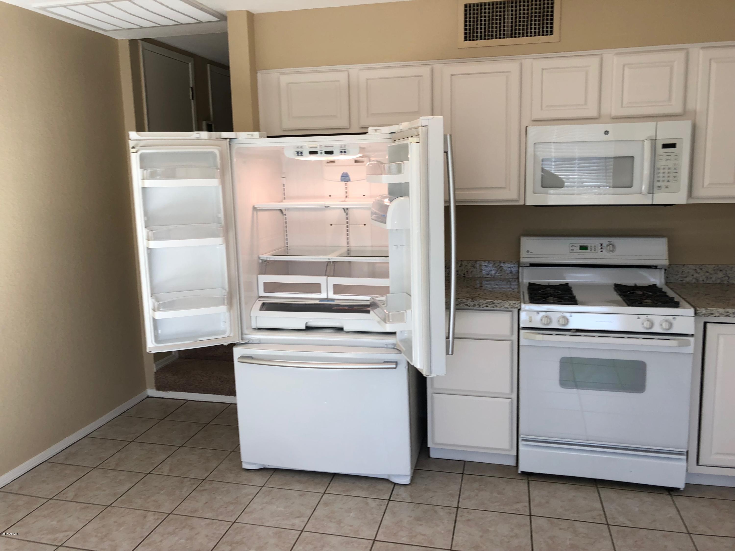 2338 West Cholla Street Phoenix, AZ 85029 - Photo 4 of 23 Fridge Gas Stove