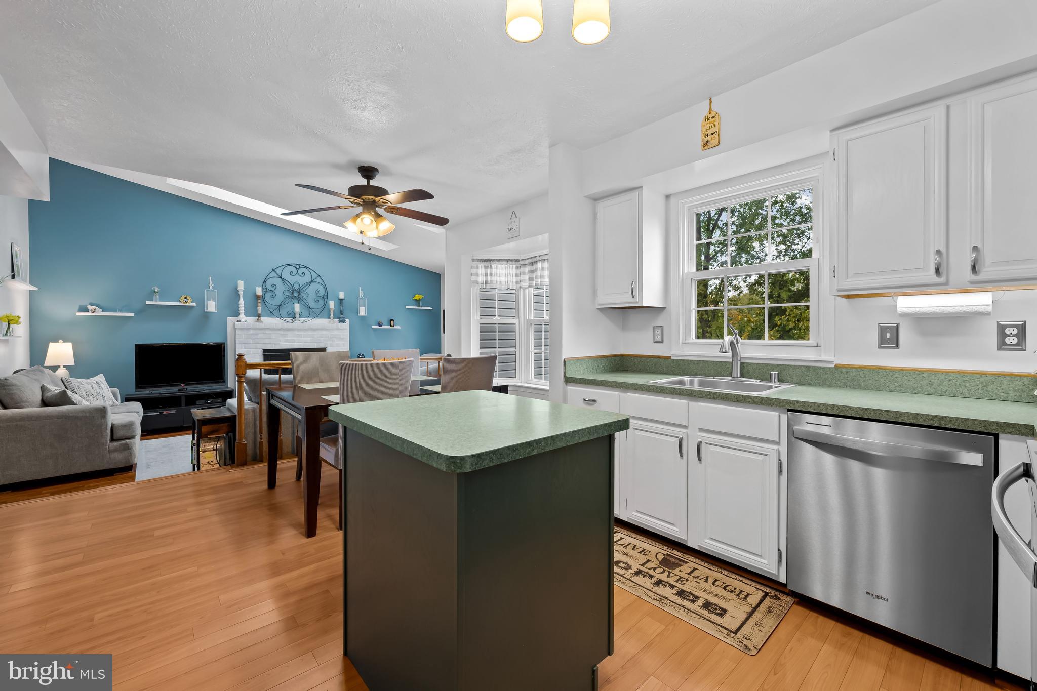 3746 Proctor Lane Nottingham, MD 21236 - Photo 11 of 36 a kitchen with a sink cabinets and window