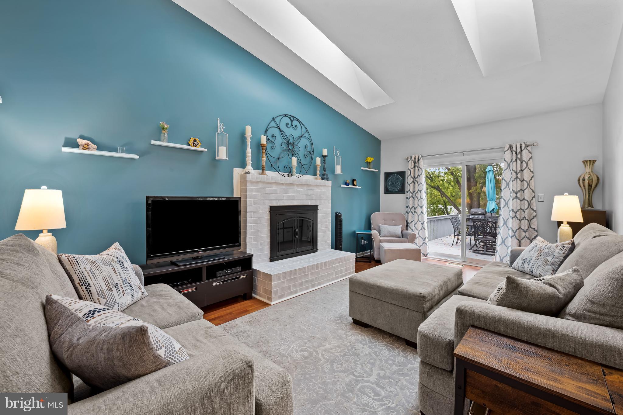 3746 Proctor Lane Nottingham, MD 21236 - Photo 18 of 36 a living room with furniture and a fireplace