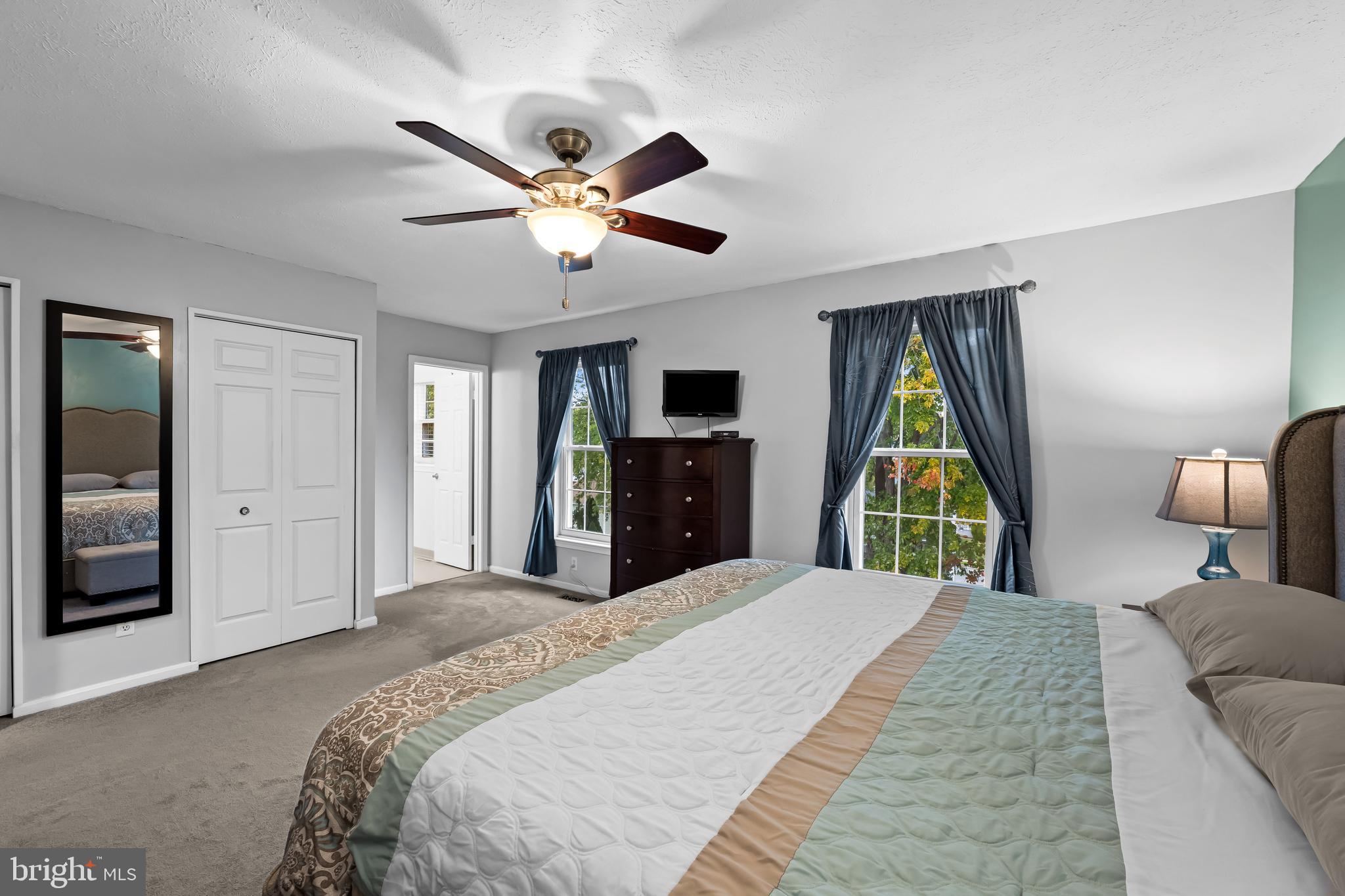 3746 Proctor Lane Nottingham, MD 21236 - Photo 24 of 36 a bed room with a bed mirror and a window